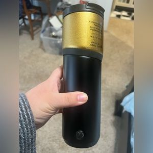 Starbucks gold and black tumbler
